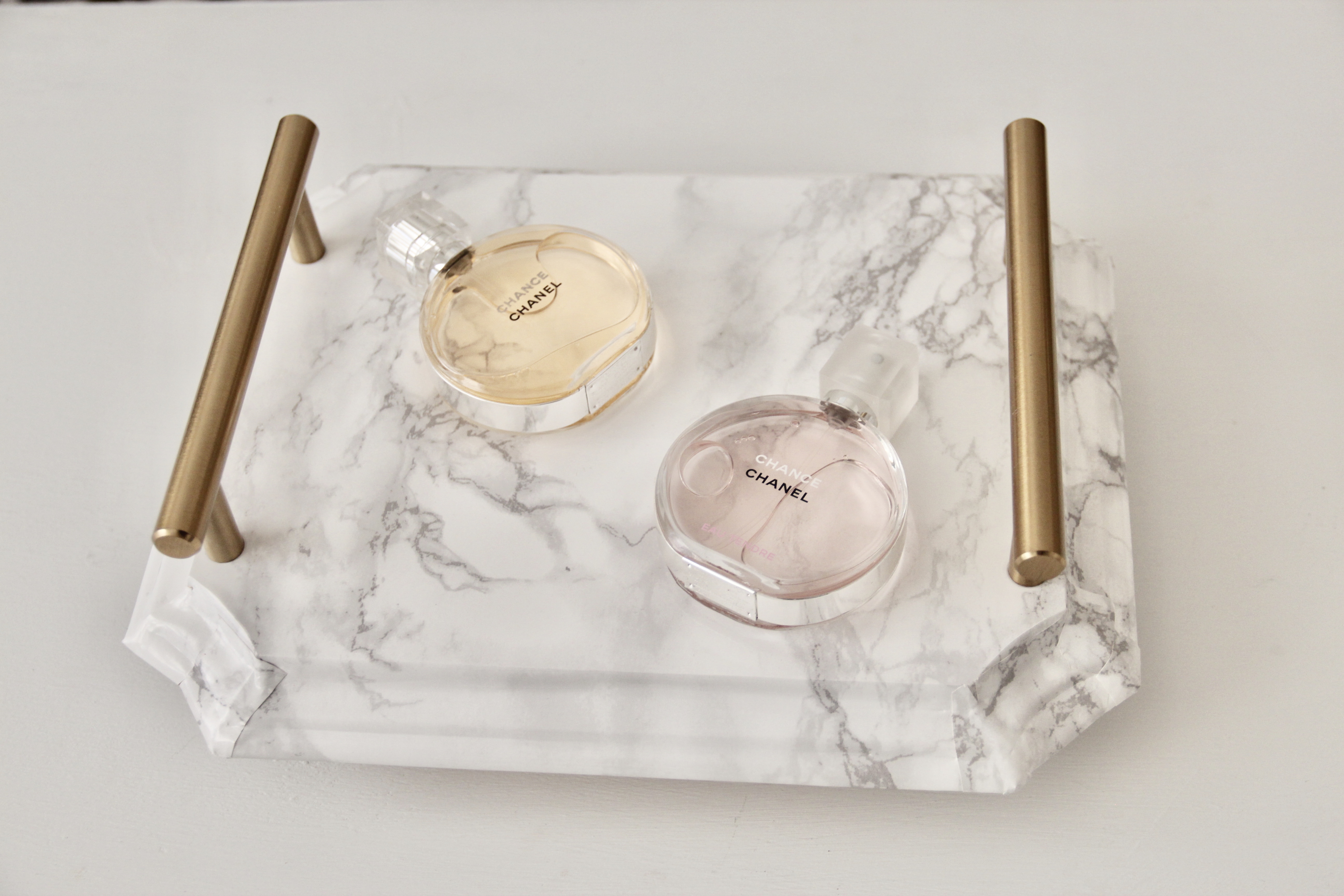 marble and gold vanity tray