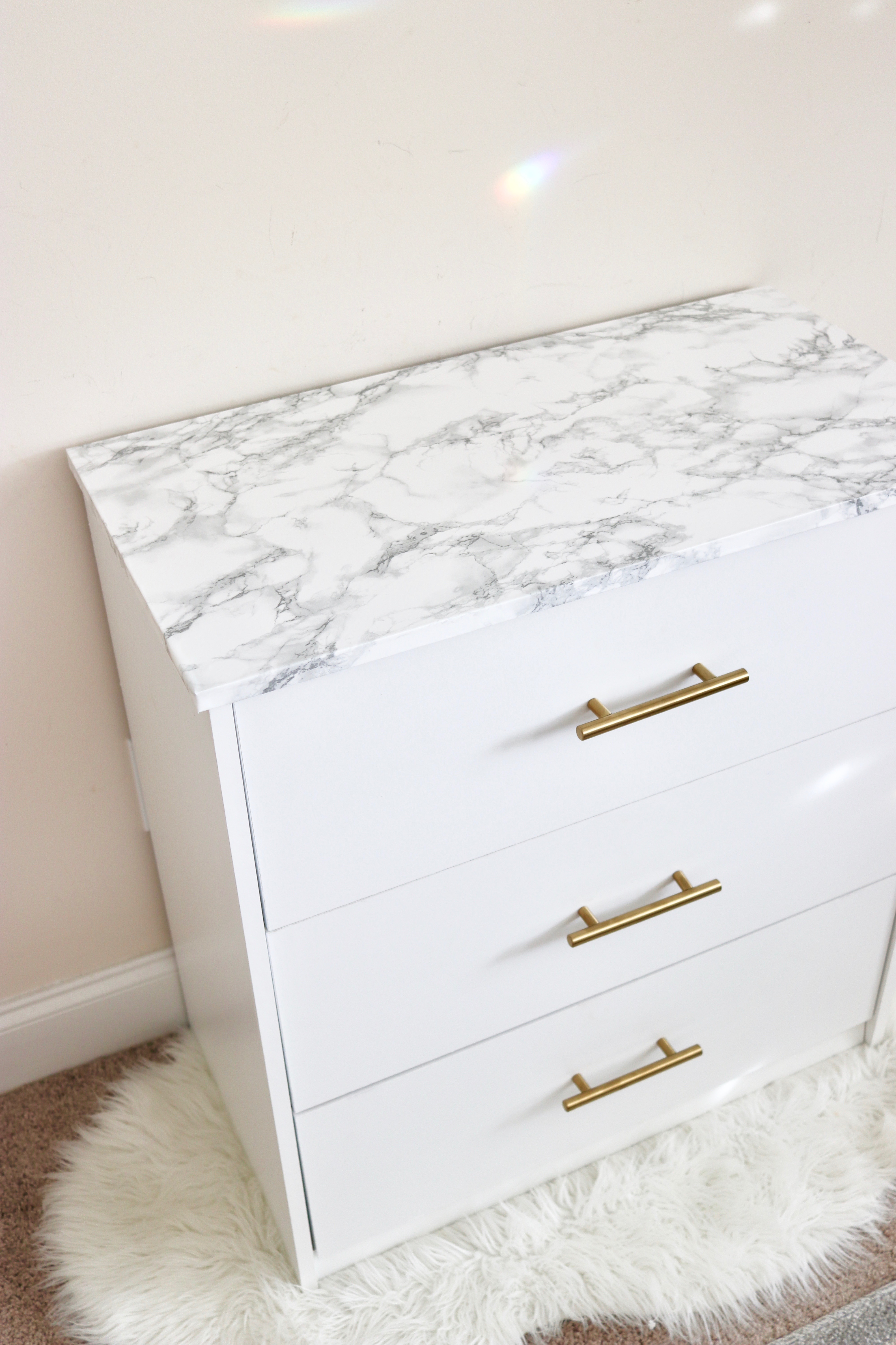 DIY marble and gold drawer hack